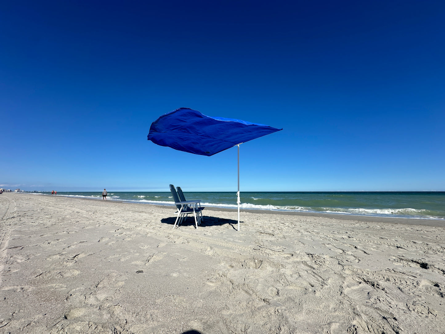 The Strand Umbrella - Breeze Powered Beach Umbrella Shade