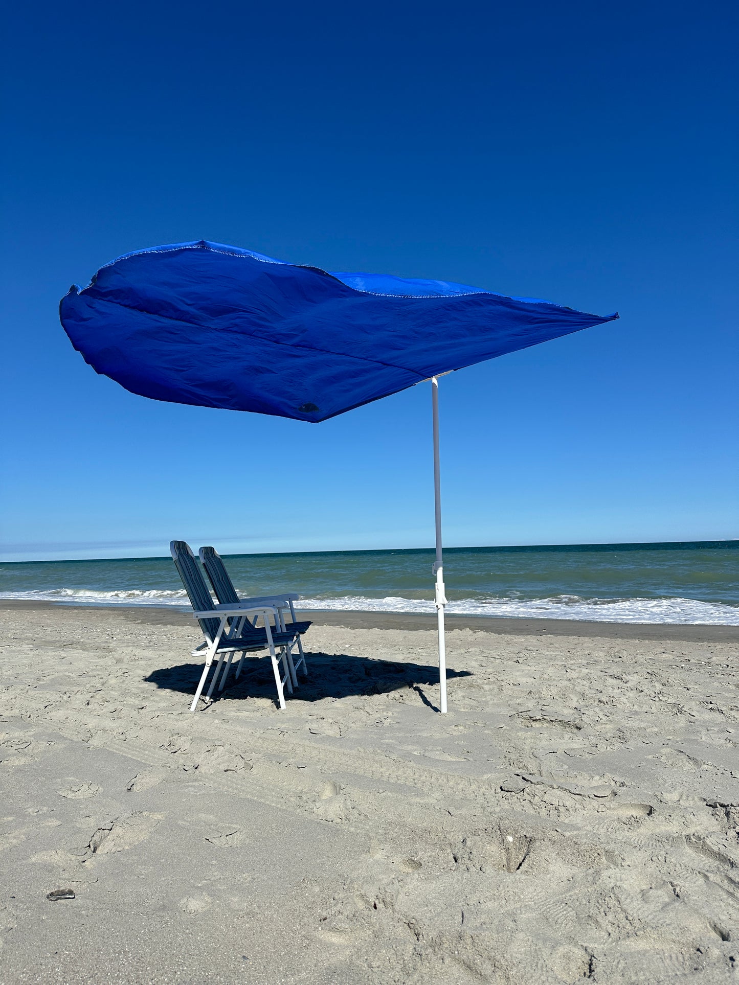 The Strand Umbrella - Breeze Powered Beach Umbrella Shade